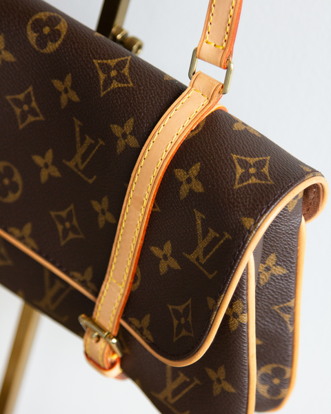 Louis Vuitton Double Buckle Pouchette Bag